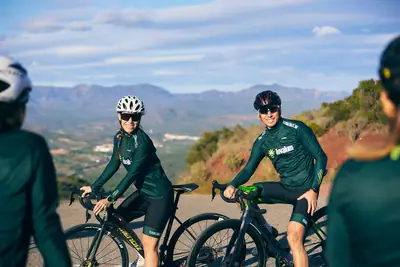 A group of road cyclists on a mountain road